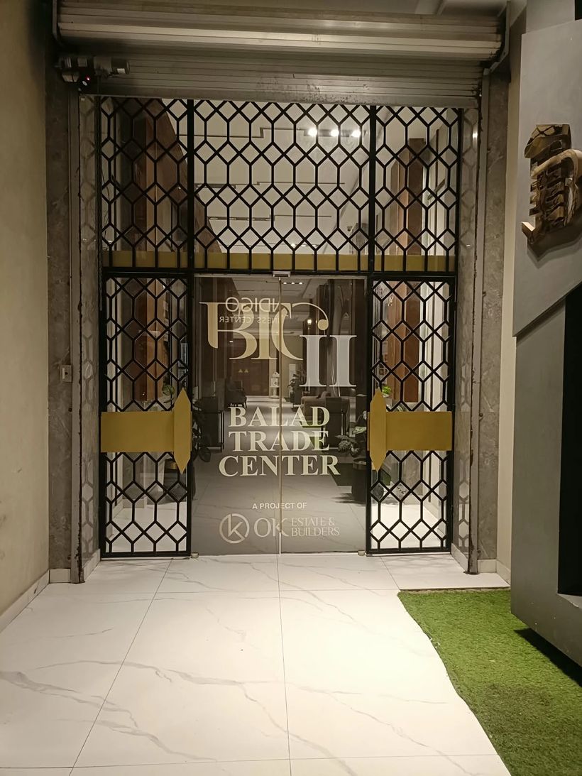 Glass entrance door of Balad Trade Center, Karachi